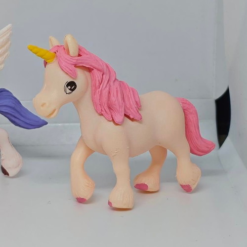 Set of 4 unicorn and pegasus figures like new