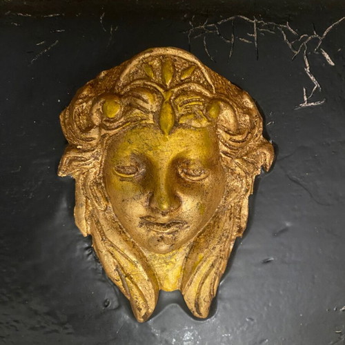Gold-colored relief head wall art with black background, new
