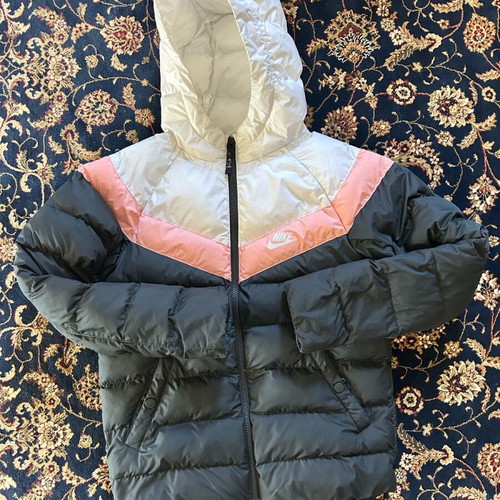 Nike jacket used for girls size Medium with stain on hood