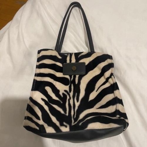 Thiros shoulder bag like new, animal print black and white