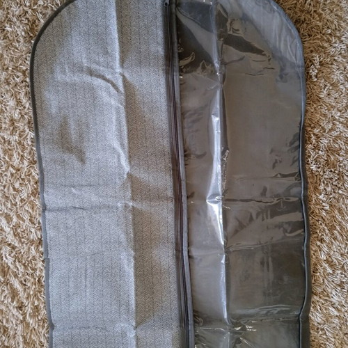 Clothes storage cover like new with hanger hole