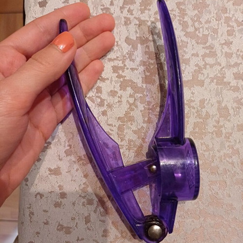 Garlic press used, plastic