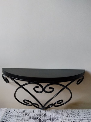 Wall shelf with black metal frame and wooden top, like new