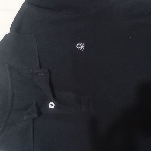 Benetton polo shirt black size 10-11 years like new