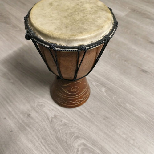 African handmade djembe used, wooden with skin
