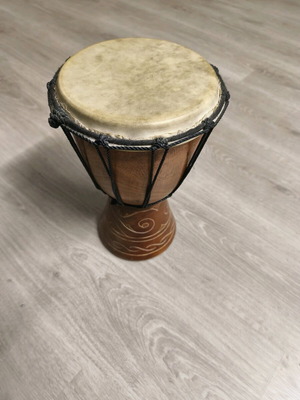 African handmade djembe used, wooden with skin