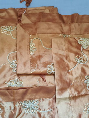 Set of 7 orange decorative table linens with embroidered flowers and beads