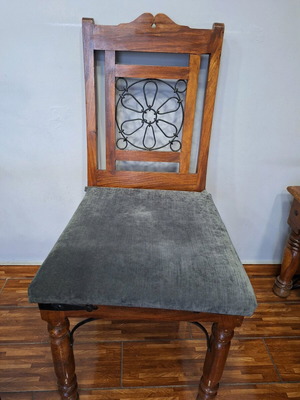 Chair made of solid wood with iron details like new