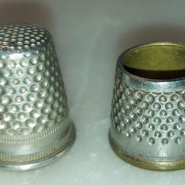 Collection of used thimbles over 40 years old