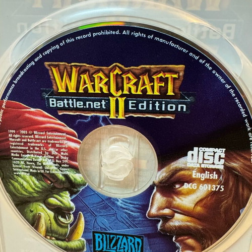 Warcraft PC games set used, Warcraft 2 Battle.net Edition no manual, Warcraft 3 with manual
