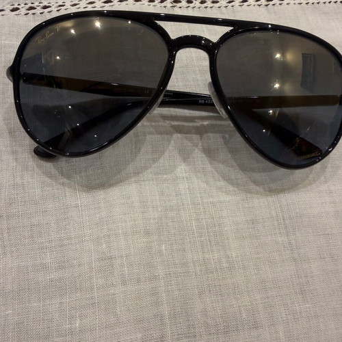 Ray Ban sunglasses black unisex used with minor lens scratches