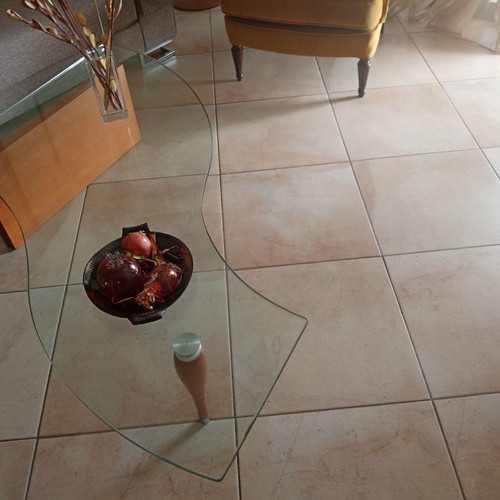 Coffee table used with thick glass top