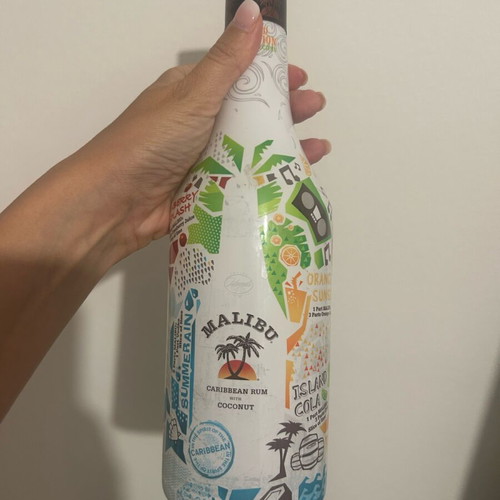 Malibu collectible empty bottle with cocktail recipes like new