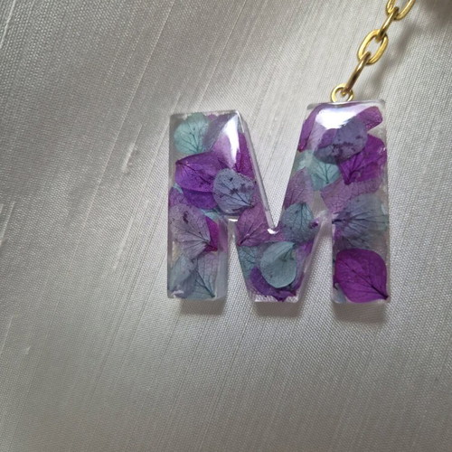 Handmade monogram keychain from resin custom made with purple and turquoise flowers