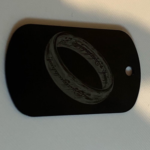 The One Ring keychain like new, black laser engraved