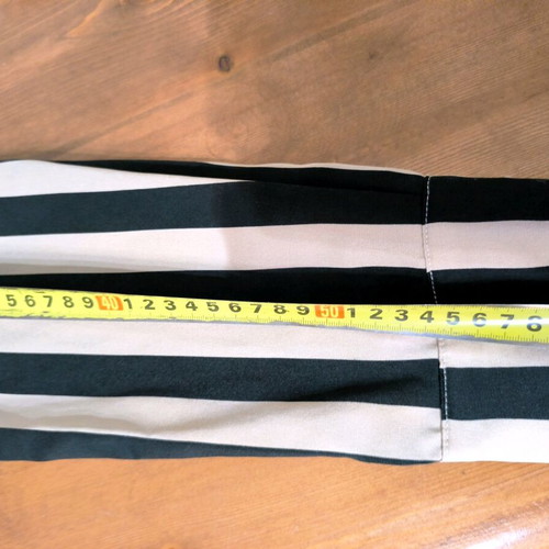 Women's shirt used with vertical stripes in beige and black