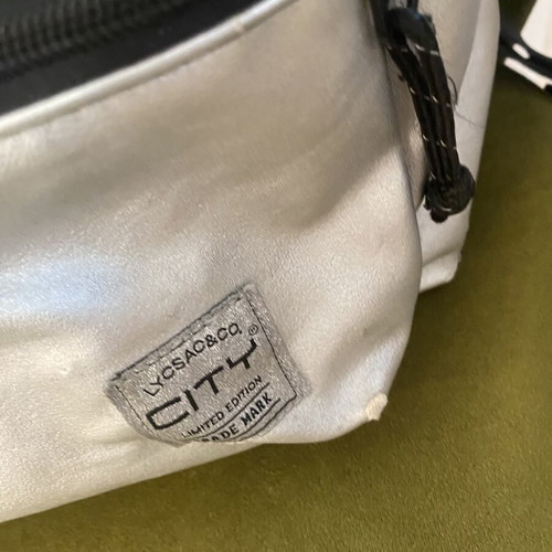 Silver matte backpack used