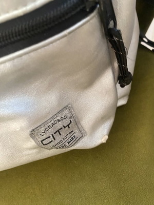 Silver matte backpack used