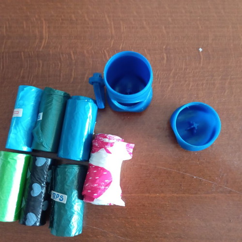Dog bag dispenser and bags in excellent condition
