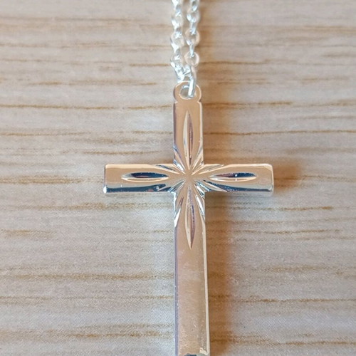 Steel cross like new, silver color