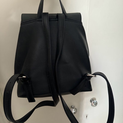 KEM black backpack bag like new with minor scratches on clasp
