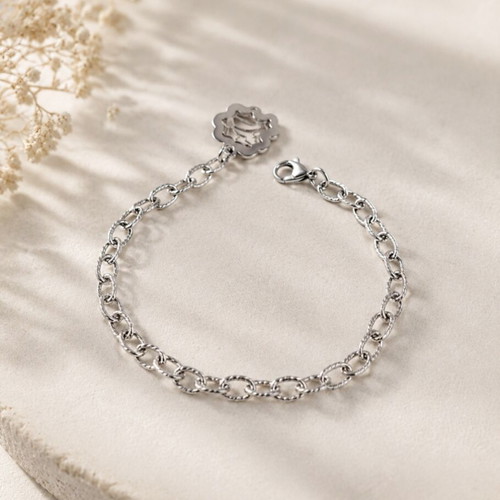 Steel bracelet with silver-tone pendant, new