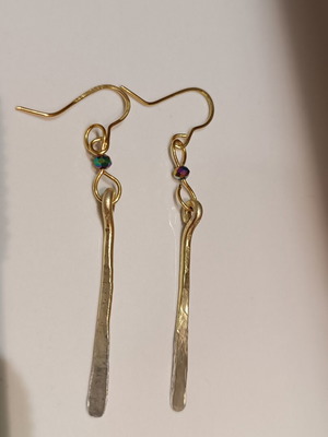 Hammered handmade earrings with blue purple iridescent bead made to order