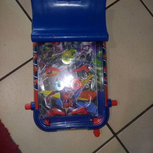 Electronic tabletop pinball used with digital scoring and sound effects