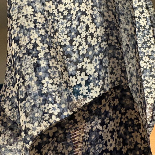 Floral women's top like new, halter neck with back zipper, semi-transparent hem