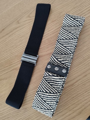 Set of two elastic women's belts like new, black and white