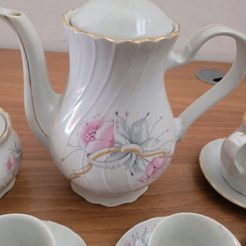 Porcelain tea set used with minor damages