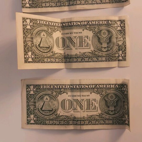 Greek and American paper money used