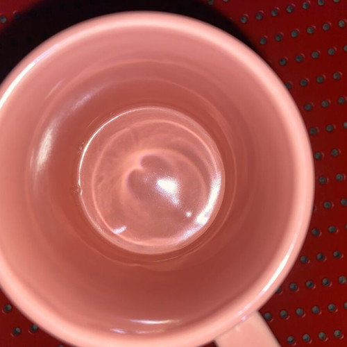 Set of 2 glass mugs used, pastel colors with prints