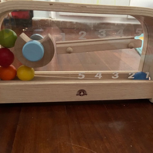 Montessori measuring toy new with wooden balls