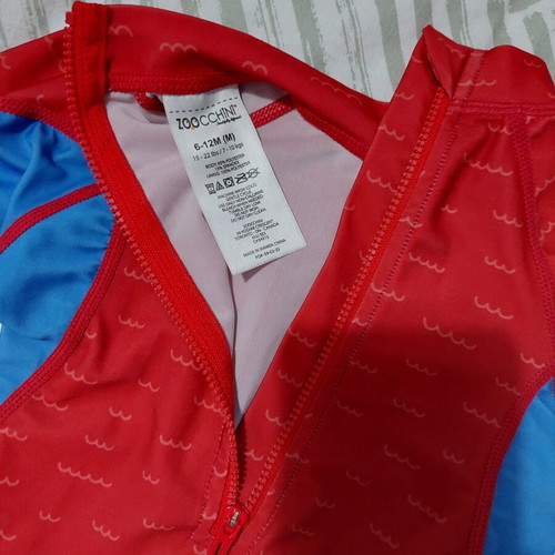 Baby swimsuit and hat like new