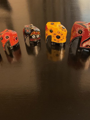 Decorative family of five wooden hand-painted elephants like new