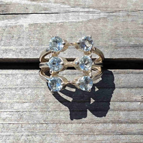 Silver ring with blue topaz