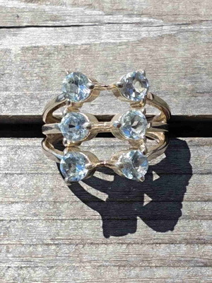 Silver ring with blue topaz