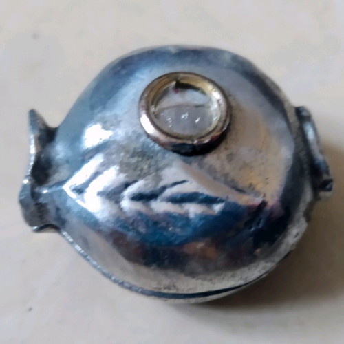 Metal handmade butterfly and metal pomegranate box used