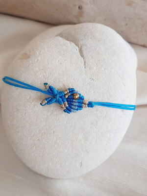 Handmade macrame fish bracelet in blue and gold