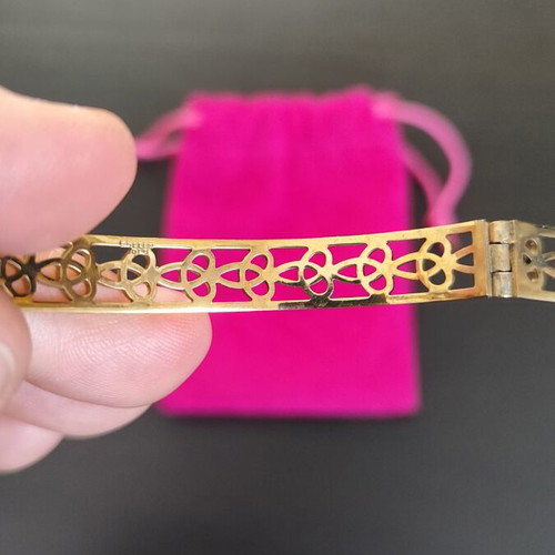Gold stainless steel bracelet with unique design like new
