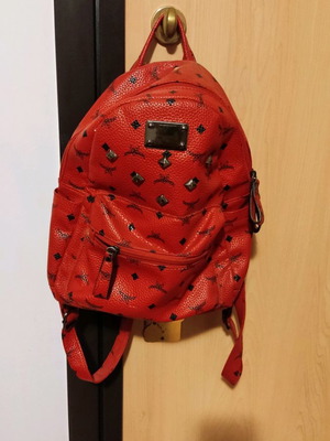 Backpack type leather used, red with black patterns