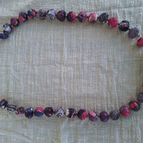 Long handmade bow tie necklace in purple and pink