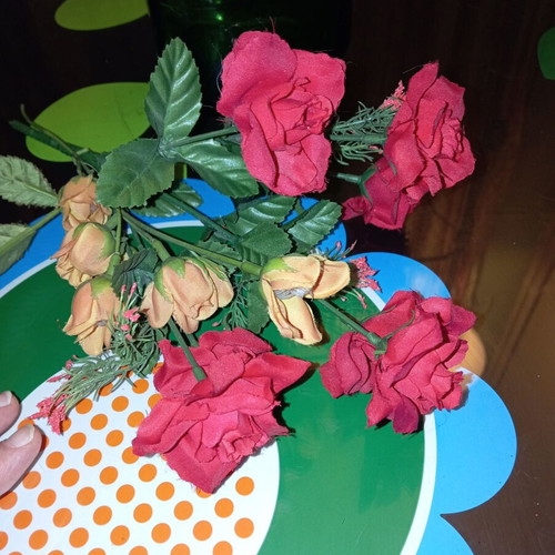 Bouquet of red artificial roses like new for decoration