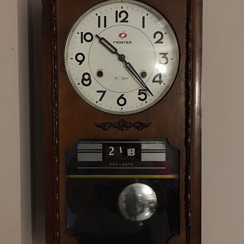 Frontier 31 Day mechanical wooden wall clock with pendulum and calendar like new