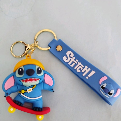 Stitch silicone keychain like new, blue and red