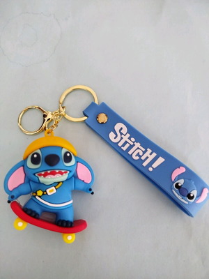 Stitch silicone keychain like new, blue and red