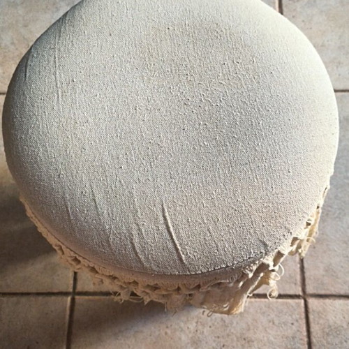 Wooden stool with macrame design