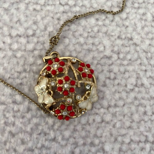 Gold pendant with butterflies and flowers like new
