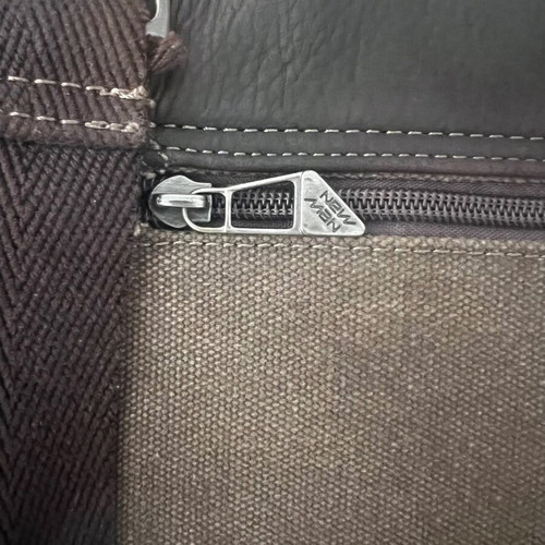 New Man messenger bag like new, leather and cotton brown shades